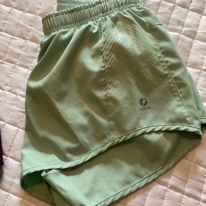 FOUR PAIRS of Oiselle distance shorts